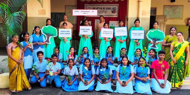 Students with their placards after a programme