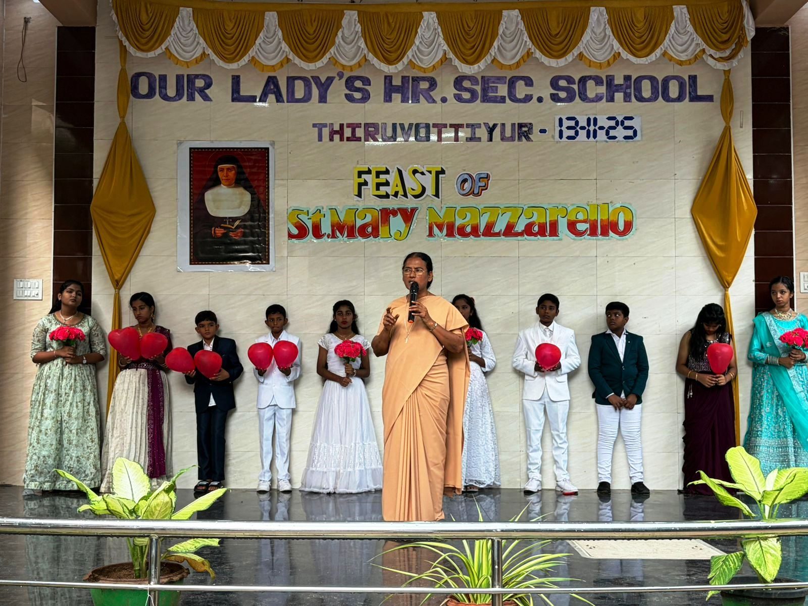 Students on stage for the Feast of St Mary Mazzarello