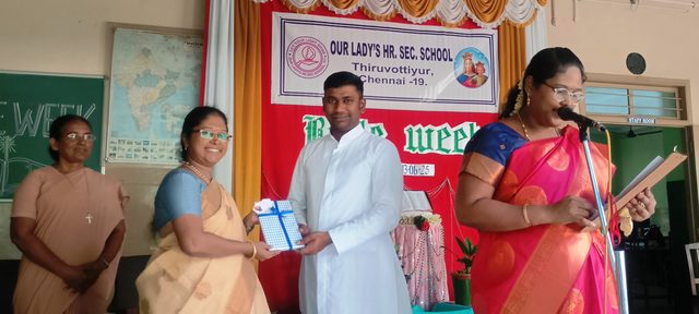 A guest being felicitated at a school function