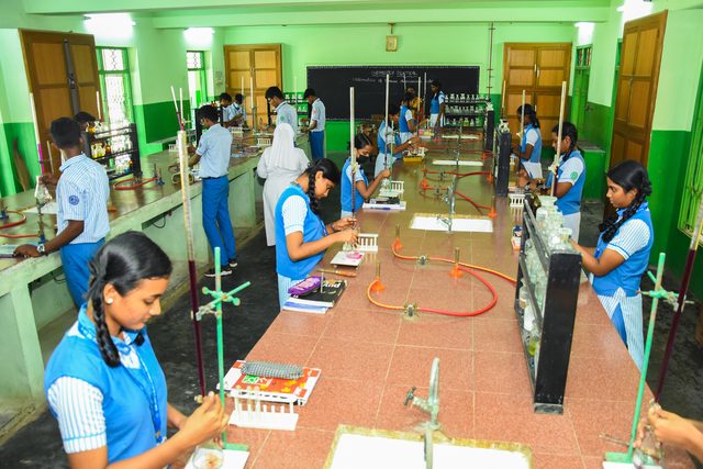 Students carrying out a titration in the chemistry laboratory