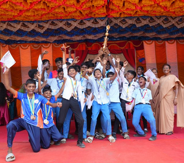 Champions celebrating on stage