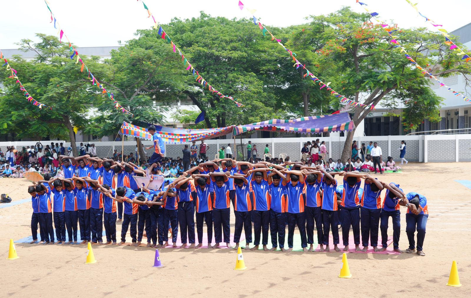 A mass drill display on the school ground at the Annual Sports Meet