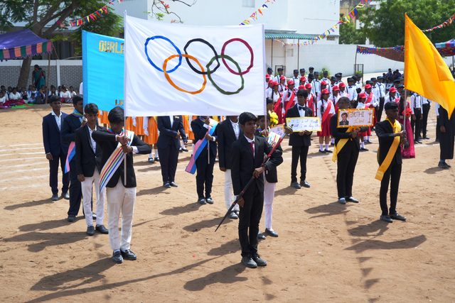 The Olympic flag carried at the head of the march past