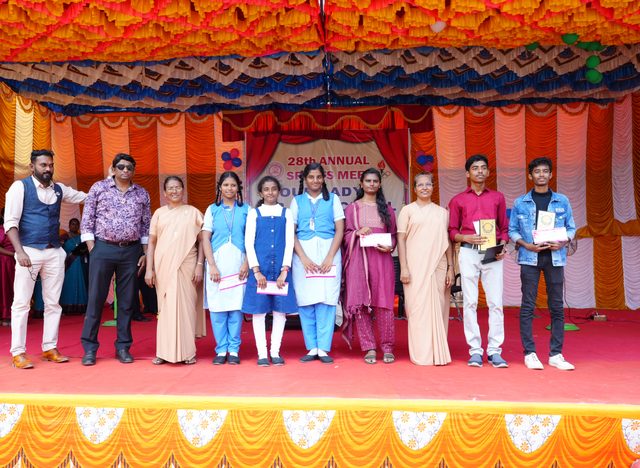 Receiving prizes at the closing ceremony
